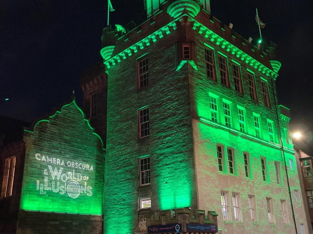 Camera Obscura lit up in green