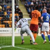 Chris Kane pressures Galatasaray goalkeeper Ismail Cipe into scoring the own goal that brought St Johnstone level. (Photo by Craig Foy / SNS Group)