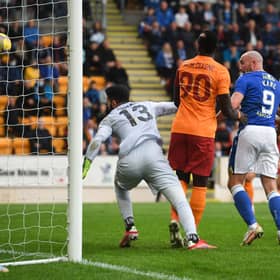 Chris Kane pressures Galatasaray goalkeeper Ismail Cipe into scoring the own goal that brought St Johnstone level. (Photo by Craig Foy / SNS Group)