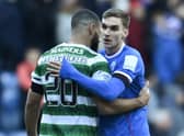Former Rangers defender James Sands (R) with Celtic's Cameron Carter-Vickers after the 2-2 draw at Ibrox on January 2.  (Photo by Rob Casey / SNS Group)
