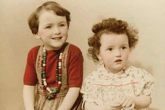Author Monique Charlesworth with her younger sister, Lorie, pictured in 1953