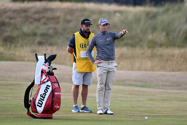 David Law and caddie Max Bill contemplate his third shot at the 17th in the opening round of the 150th Open at St Andrews. Picture: Ian Rutherford.