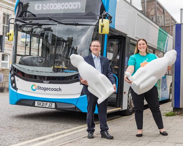 Daniel Laird, commercial director of Stagecoach North Scotland and Fiona Fernie, CEO of Clan Cancer Support.