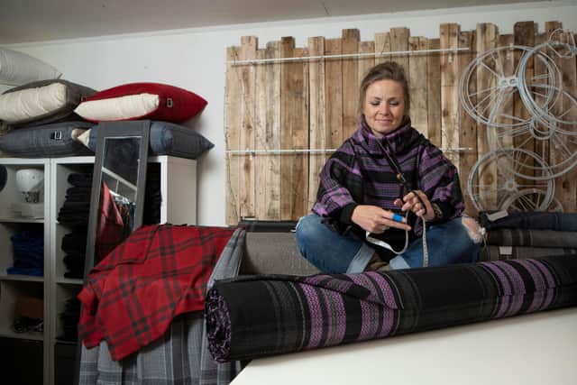 Clare Campbell, owner of Prickly Thistle has created a new tartan celebrating Scotland's heritage.