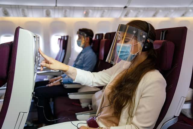 Qatar is one of the first airlines to require passengers to wear face shields.