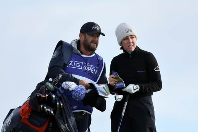 Georgia Hall and her caddie look across the 12th hole on the Old Course during day one of the AIG Women's Open. Picture: Michael Reaves/Getty Images.