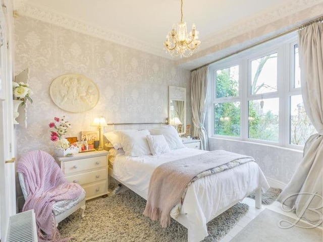 It's time now to take a look at the main three bedrooms, beginning with the delightful master. It boasts decorative coving and a bay window overlooking the front of the Alexandra Avenue property.
