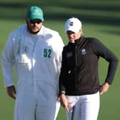 Hannah Darling talks with her caddie during the final round of the Augusta National Women's Amateur at Augusta National Golf Club. Picture: Gregory Shamus/Getty Images.