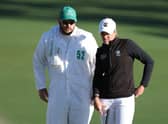 Hannah Darling talks with her caddie during the final round of the Augusta National Women's Amateur at Augusta National Golf Club. Picture: Gregory Shamus/Getty Images.
