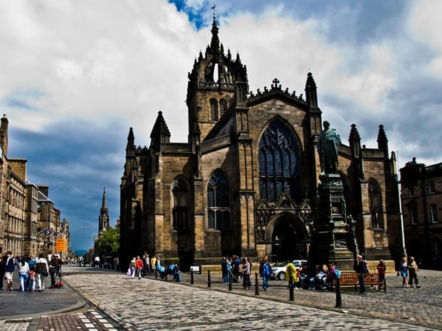 Founded in the 12th century, St Giles’ Cathedral can be considered one of Edinburgh’s oldest buildings. In its early days, St Giles’ was just a small stone kirk, which stood roughly on the site of the present-day nave. This church was burned down by an attacking English army in the 14th century and subsequently rebuilt in spectacular fashion, owing the building its current look with distinct crown steeple. Although most of the church dates from later centuries, there are elements contained deep within which are considerably ancient. St Giles’ original 12th century doorway survived until just 200 years ago. Despite not having been a seat of bishops since 1638, St Giles’, similar to Glasgow Cathedral, has retained its title as a cathedral.