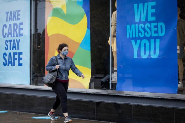 A solitary shopper on Edinburgh's Princes Street during last year's lockdown