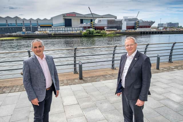 Paul Feely, engineering director and chair of Net Zero Task Force for BAE Systems, and Barry Fisher, chief executive of Keep Scotland Beautiful, launch their new anti-littering partnership at Glasgow Harbour, across the Clyde from the Govan Shipyard. Picture: Peter Devlin