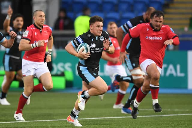 Glasgow Warriors' Duncan Weir runs through for the opening try against Newcastle Falcons. Picture: Ross MacDonald/SNS