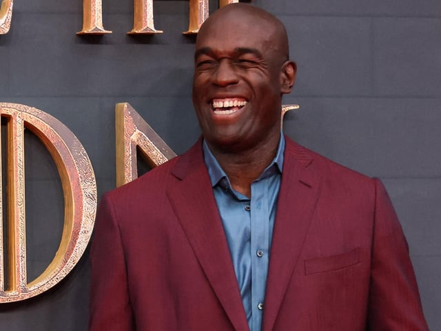 Steve Toussaint, who plays the "Sea Snake" Corlys Velaryon, poses on the red carpet at the House of the Dragon premiere (Photo by HOLLIE ADAMS / AFP)