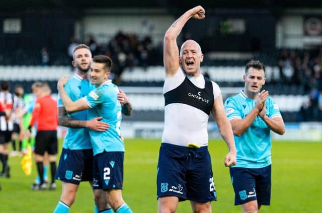 Dundee's Charlie Adam celebrates the club's first away win of the cinch Premiership season. (Photo by Roddy Scott / SNS Group)