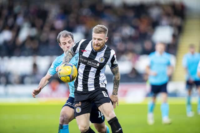 St Mirren's Alan Power (right) is hassled by Dundee FC's Paul McGowan. (Photo by Roddy Scott / SNS Group)