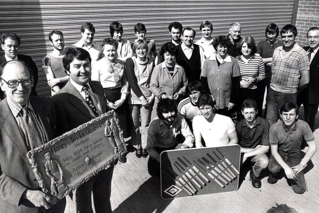 Engineering director at Henry Taylor Tools Ltd., Gordon Russell, left, and the entire workforce, after they were awarded the Queen's Award for Industry, April 1981