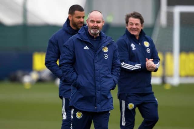 Scotland manager Steve Clarke with his assistants Steven Reid (left) and John Carver (right). (Photo by Craig Williamson / SNS Group)