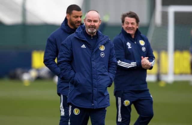Scotland manager Steve Clarke with his assistants Steven Reid (left) and John Carver (right).  (Photo by Craig Williamson / SNS Group)