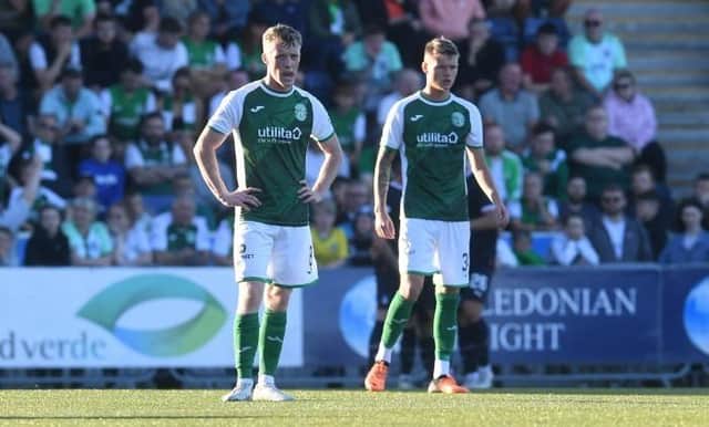Jake Doyle-Hayes and Kyle McClelland after Hibs were defeated 1-0 by Falkirk in the Premier Sports Cup. Picture: SNS