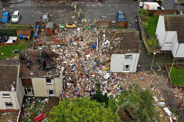 An aerial view of a house explosion in Gorse Park in the Kincaidston area on October 19, 2021 in Ayr, Scotland. Local media reported that two adults and two children were taken to hospital after last night's explosion, which destroyed a terraced house and damaged nearby homes. (Photo by Jeff J Mitchell/Getty Images)