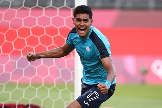 KASHIMA, JAPAN - JULY 25: Luis Palma #17 of Team Honduras celebrates after scoring their side's first goal during the Men's First Round Group B match between New Zealand and Honduras on day two of the Tokyo 2020 Olympic Games at Ibaraki Kashima Stadium on July 25, 2021 in Kashima, Ibaraki, Japan. (Photo by Atsushi Tomura/Getty Images)