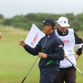 American Berry Henson celebrates an eagle with his caddie on the 12th hole during the second round of the Hero Open at Fairmont St Andrews. Picture: Andrew Redington/Getty Images.