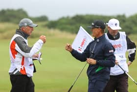 American Berry Henson celebrates an eagle with his caddie on the 12th hole during the second round of the Hero Open at Fairmont St Andrews. Picture: Andrew Redington/Getty Images.