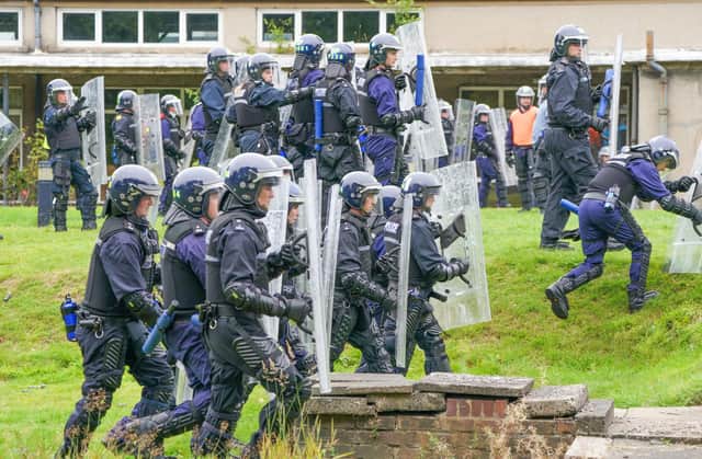 Police Scotland officers take part in a public order training session in preparation ahead of the COP26 climate summit (Picture: Jane Barlow/pool/AFP via Getty Images)