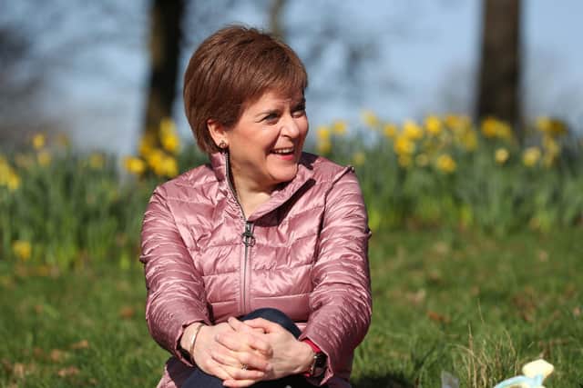 Scotland's First Minister and leader of the Scottish National Party (SNP) Nicola Sturgeon at Ruchill Park in Glasgow during campaigning for the Scottish Parliamentary election. Picture date: Saturday April 3, 2021.