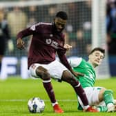 Beni Baningime (left) of Hearts in action against Dylan Levitt of Hibs during the last derby at Easter Road.