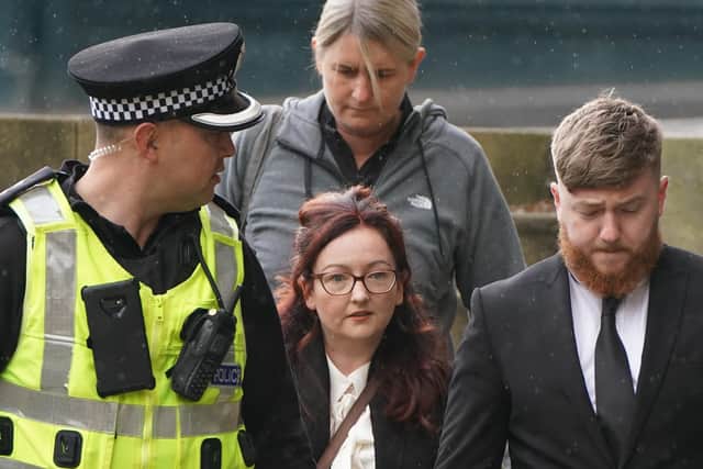 Former PC Nicole Short (centre) who stands just 5ft 1in tall, was forced to retire after sustaining injuries during the detention of Sheku Bayoh
Pic: Andrew Milligan