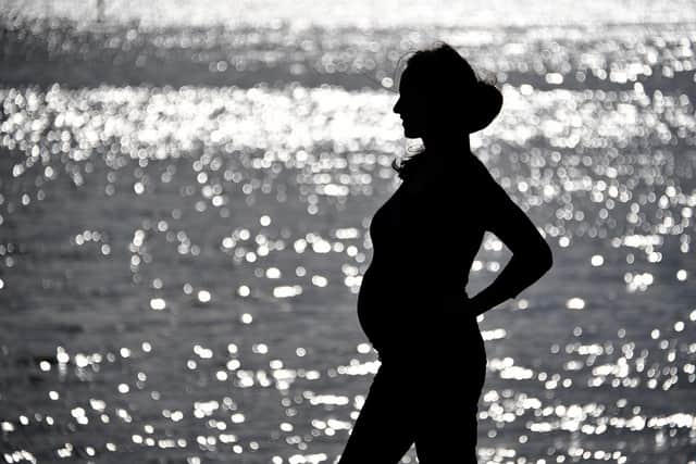 In the book, A Woman, the narrator decries the societal expectation of motherly self-sacrifice (Picture: Loic Venance/AFP via Getty Images)