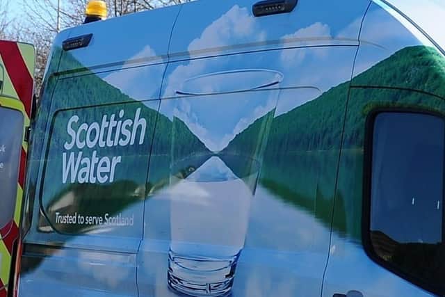Scottish Water has been assisting residents affected by the diesel spill by delivering bottled water (Picture: Michael Gillen, National World)