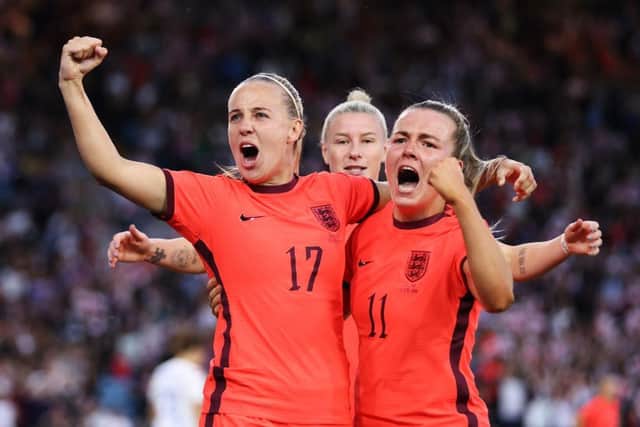 Beth Mead scoring her side's second goal with teammates Lauren Hemp against the Netherlands last week (Photo by George Wood/Getty Images)