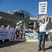 Campaigners gather outside Holyrood to protest short-term let licensing plans (Picture: Lisa Ferguson)