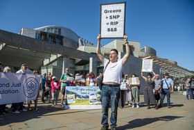 Campaigners gather outside Holyrood to protest short-term let licensing plans (Picture: Lisa Ferguson)