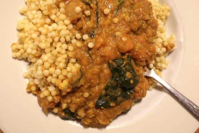 Our click and collect meal order from the Papermill, Lasswade. Sweet potato and lentil dahl with wilted spinach and saffron giant couscous.