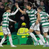 Celtic's Oh Hyeon-gyu celebrates with Kyogo Furuhashi after making it 2-1 over St Mirren.  (Photo by Alan Harvey / SNS Group)