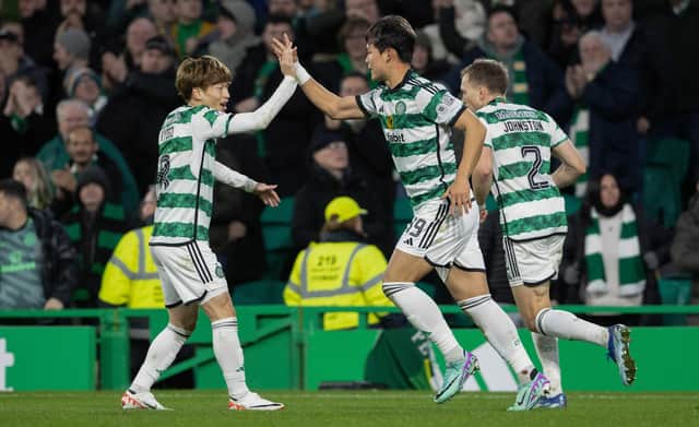 Celtic's Oh Hyeon-gyu celebrates with Kyogo Furuhashi after making it 2-1 over St Mirren.  (Photo by Alan Harvey / SNS Group)