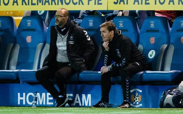 Kilmarnock's head of football operations James Fowler (right) looks on as the Rugby Park side draw 1-1 at home to Morton on Wednesday night. (Photo by Sammy Turner / SNS Group)