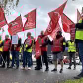 Workers on strike outside the Co-op coffin factory in Glasgow. Picture: Rebecca McCurdy/PA Wire