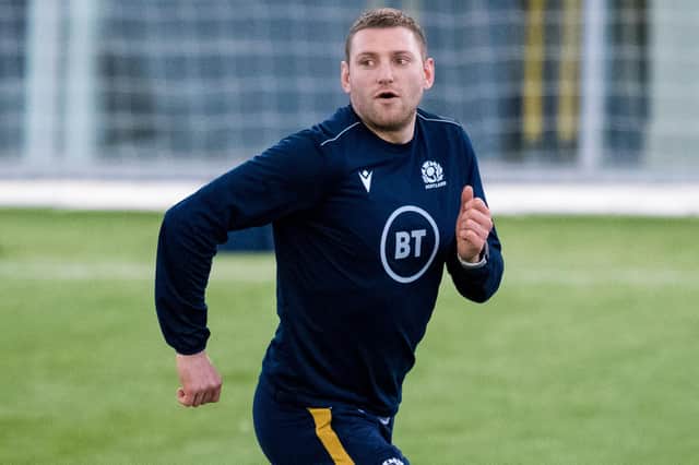 Finn Russell trains ahead of Scotland's clash with France on Friday.
