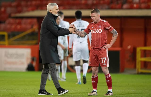 Former Aberdeen manager Jim Goodwin and Jonny Hayes after a recent draw with Ross County.