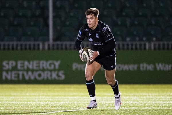 Huw Jones in action for Glasgow Warriors during the 2020-21 season. He will rejoin the club in the summer  (Photo by Ross MacDonald / SNS Group)