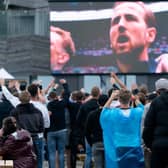 England fans watch the England v Germany Euro 2020 match on a big screen in a fan zone on Hastings pier