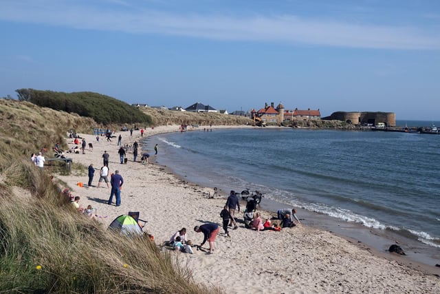 Don't expect to see this many people at Beadnell on a winter's day but it is one of the more sheltered bays on the Northumberland coast with a glorious beach and historic lime kilns to explore. There are a couple of excellent pub restaurants in the centre of the village too, a short stroll away.