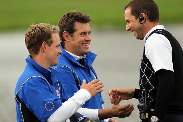 Sergio Garcia chats with Luke Donald, left, and Lee Westwood during the 2010 Ryder Cup in Wales. Picture: Jamie Squire/Getty Images.