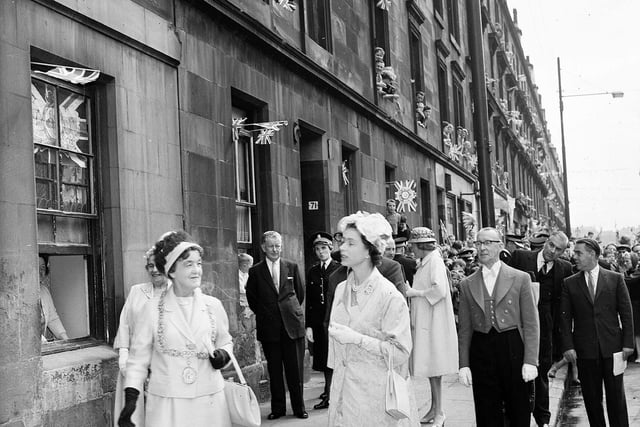 The Queen and Duke of Edinburgh visit the Gorbal, in Glasgow, in 1964.