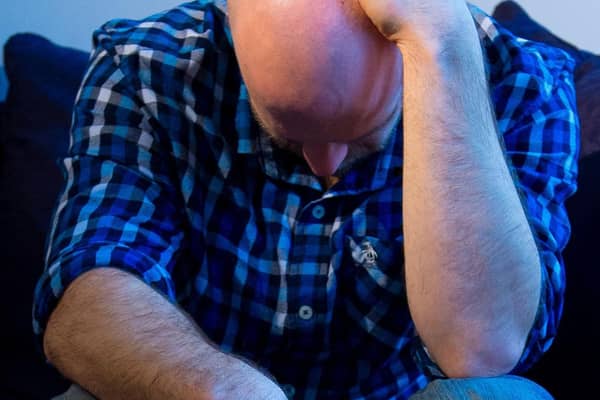 A man showing signs of depression. Picture: Dominic Lipinski/PA Wire